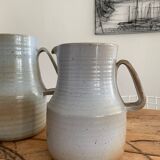 Pair vintage enamelled ceramic pitchers