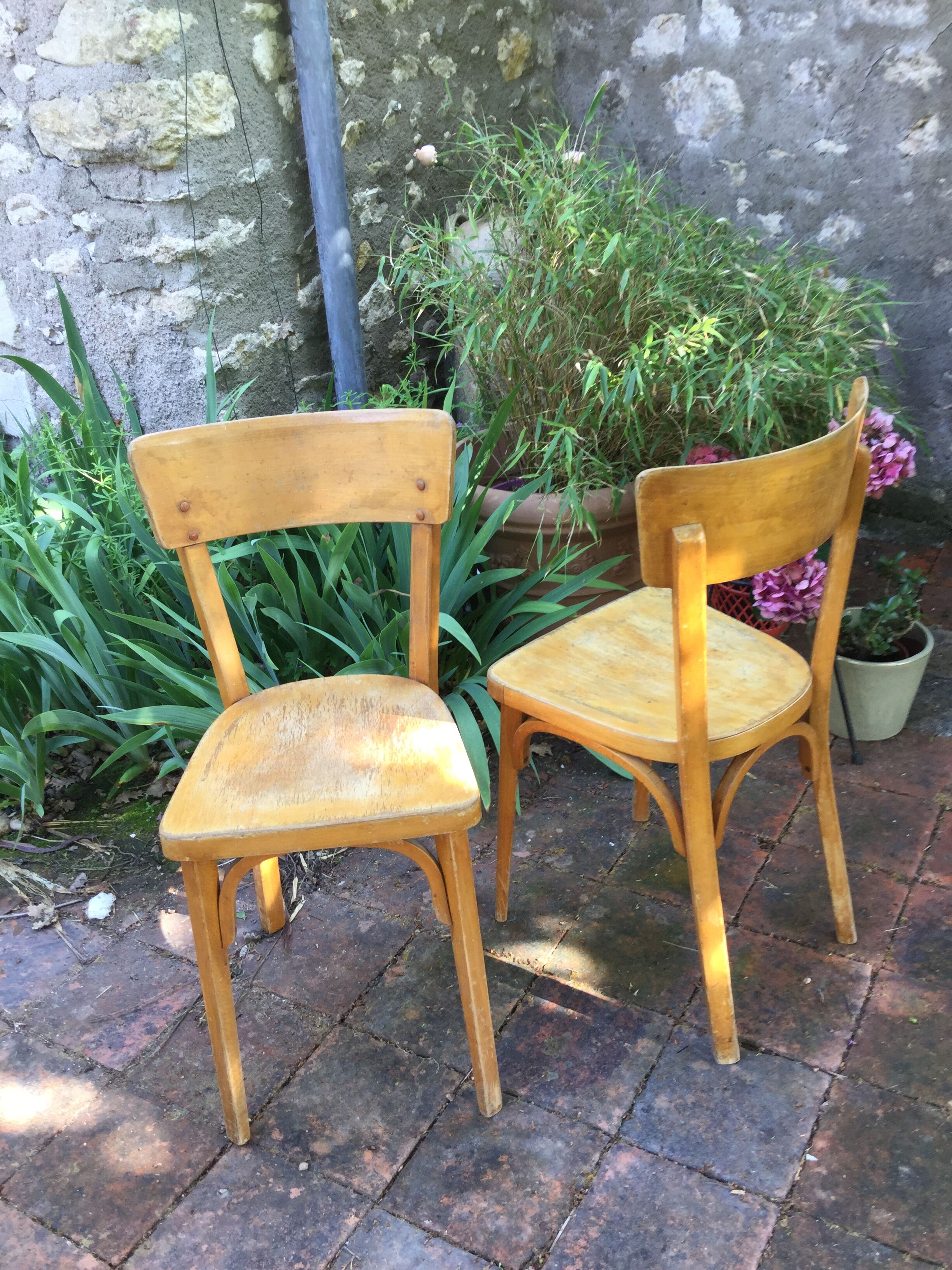 Pair of bistro Baumann chairs