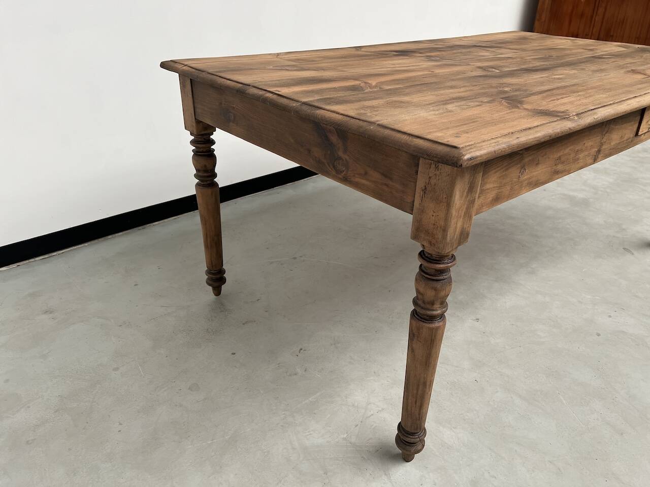Antique farm table from the 1950s, with 3 drawers and turned legs