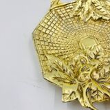 Art deco pocket emptier