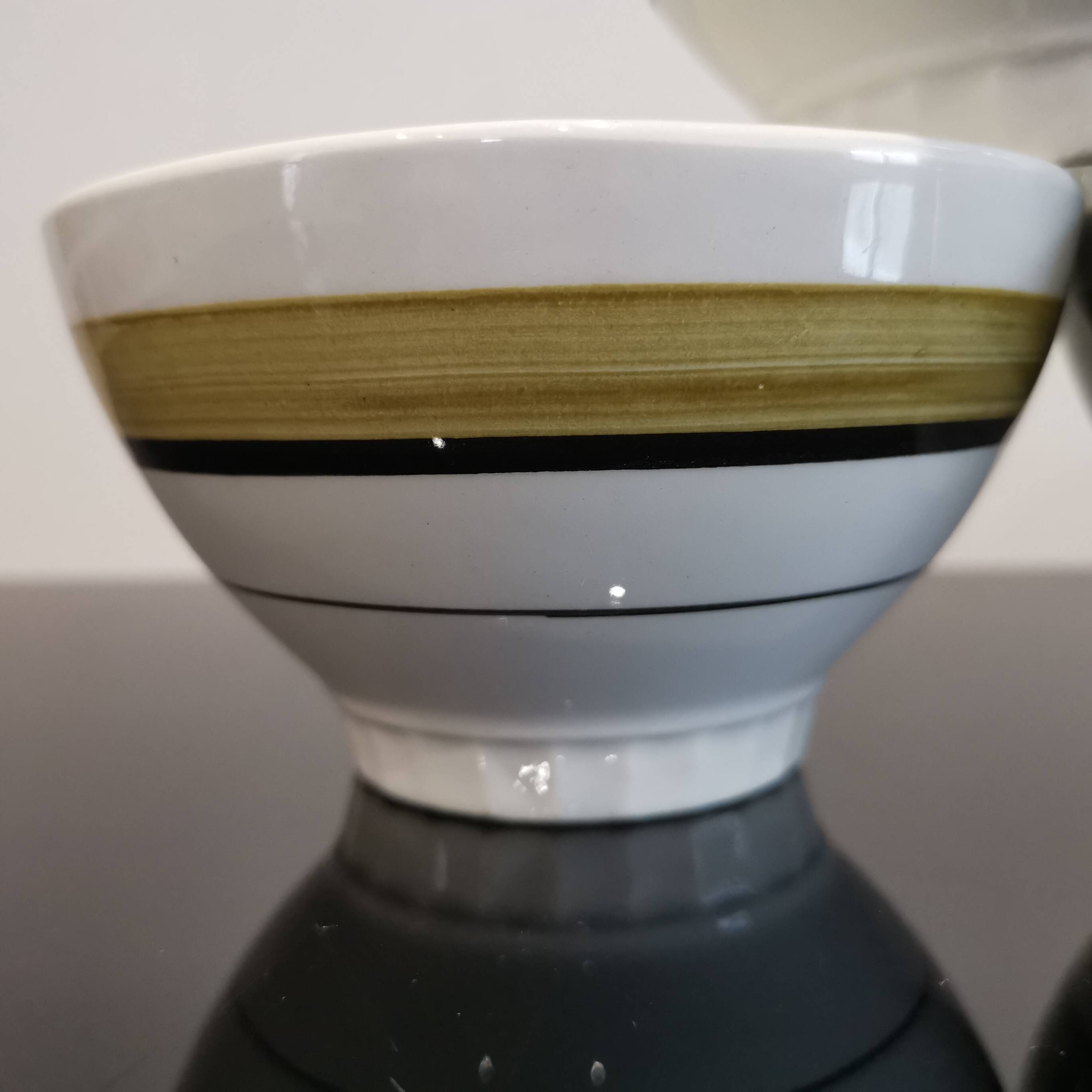 Series of 5 small old earthenware bowls with olive green edging