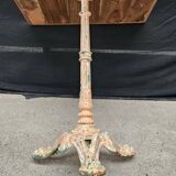 Bistro table with cast iron base and solid teak top
