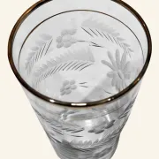 Four engraved crystal glasses from La Granja, with gilded edges, early 20th century.
