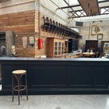 Huge bar counter covered in blue stone