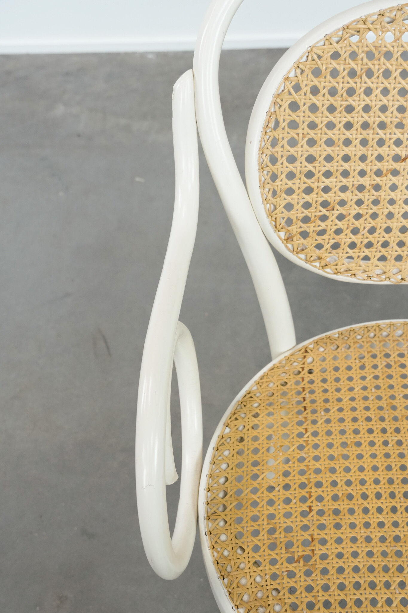 Vintage white bistro chair with armrests in Thonet style
