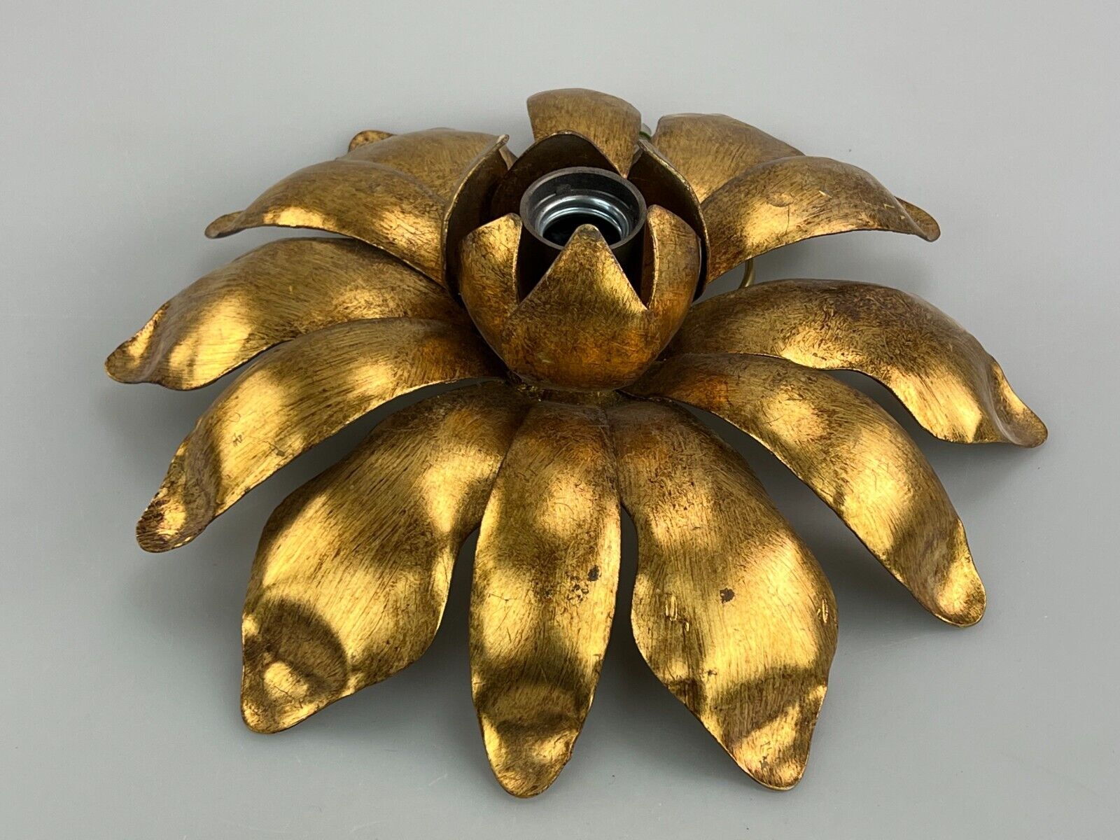Wall sconce in brass