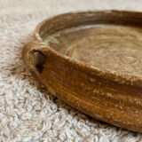 Round stoneware plate with handles