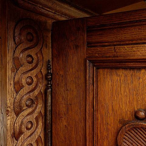 Antique small Linen in carved oak