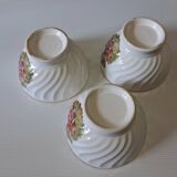Set of 3 faceted earthenware bowls with decoration in good condition.