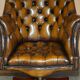 Fauteuil Chesterfield directeur ou capitaine Art Déco en cuir restauré