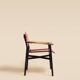 Maërl armchair, Galathée model, red leather, solid wood armrests of your choice
