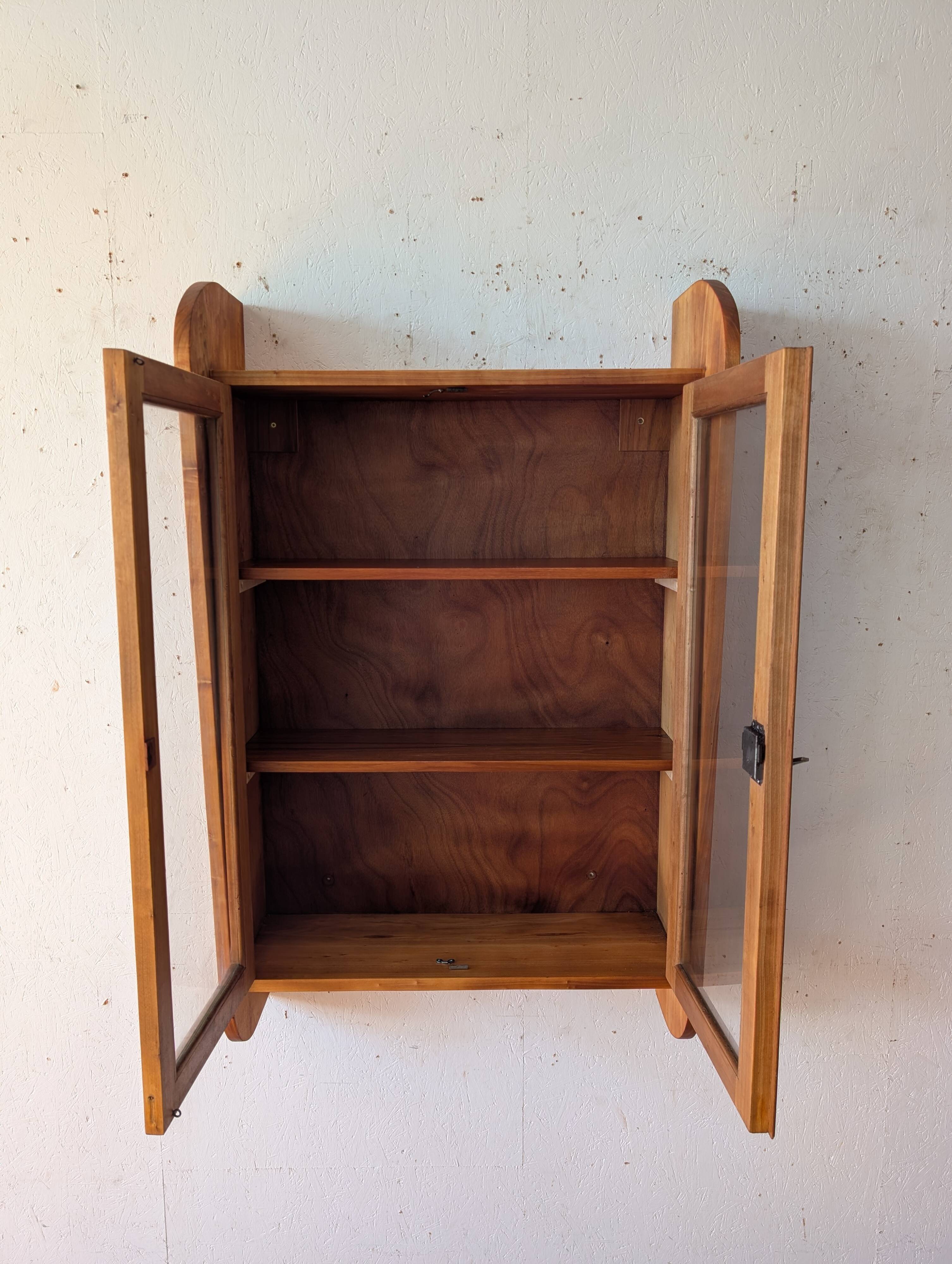 Solid cherry wood wall display case from the 50s