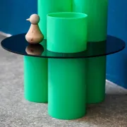 Green plexiglass coffee table in Memphis design style from the 1980s.