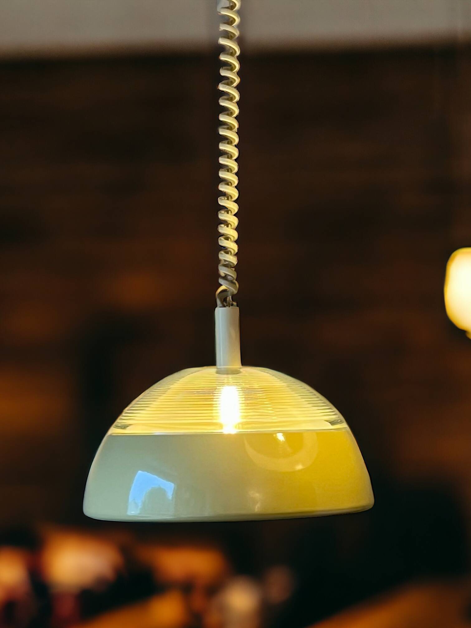 Space-age pendant light in holophane glass and lacquered metal from the 70s.