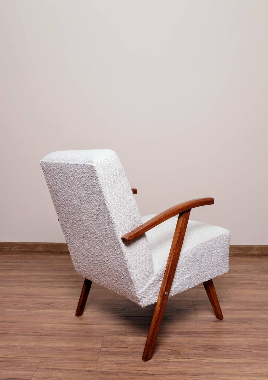 Vintage armchair in pearl white bouclé with walnut wood, 1960.