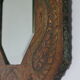 Antique bevelled artisanal mirror in repoussé copper - 54x45cm