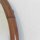 Vintage oval rattan mirror