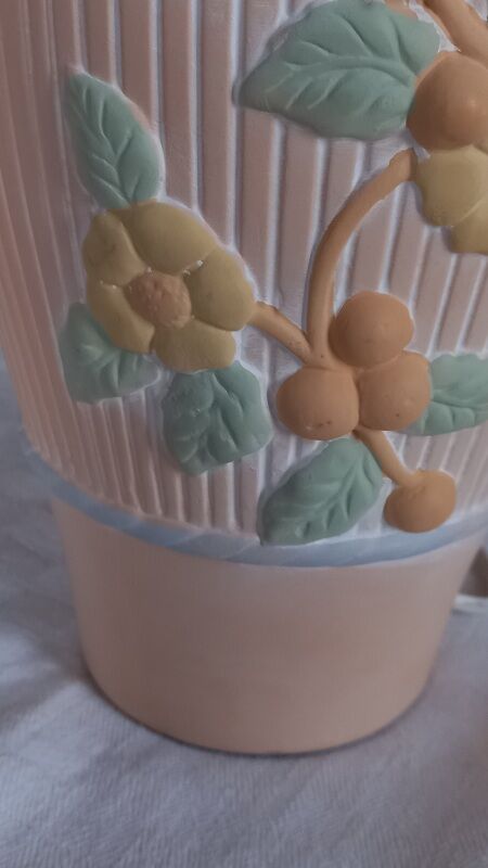 Terracotta lamp foot, floral decoration in strong relief.