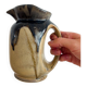Antique carafe in flamed enamelled ceramic