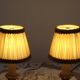 Paire de lampes candélabres vintage en bronze avec abat-jours en tissu plissé, France
