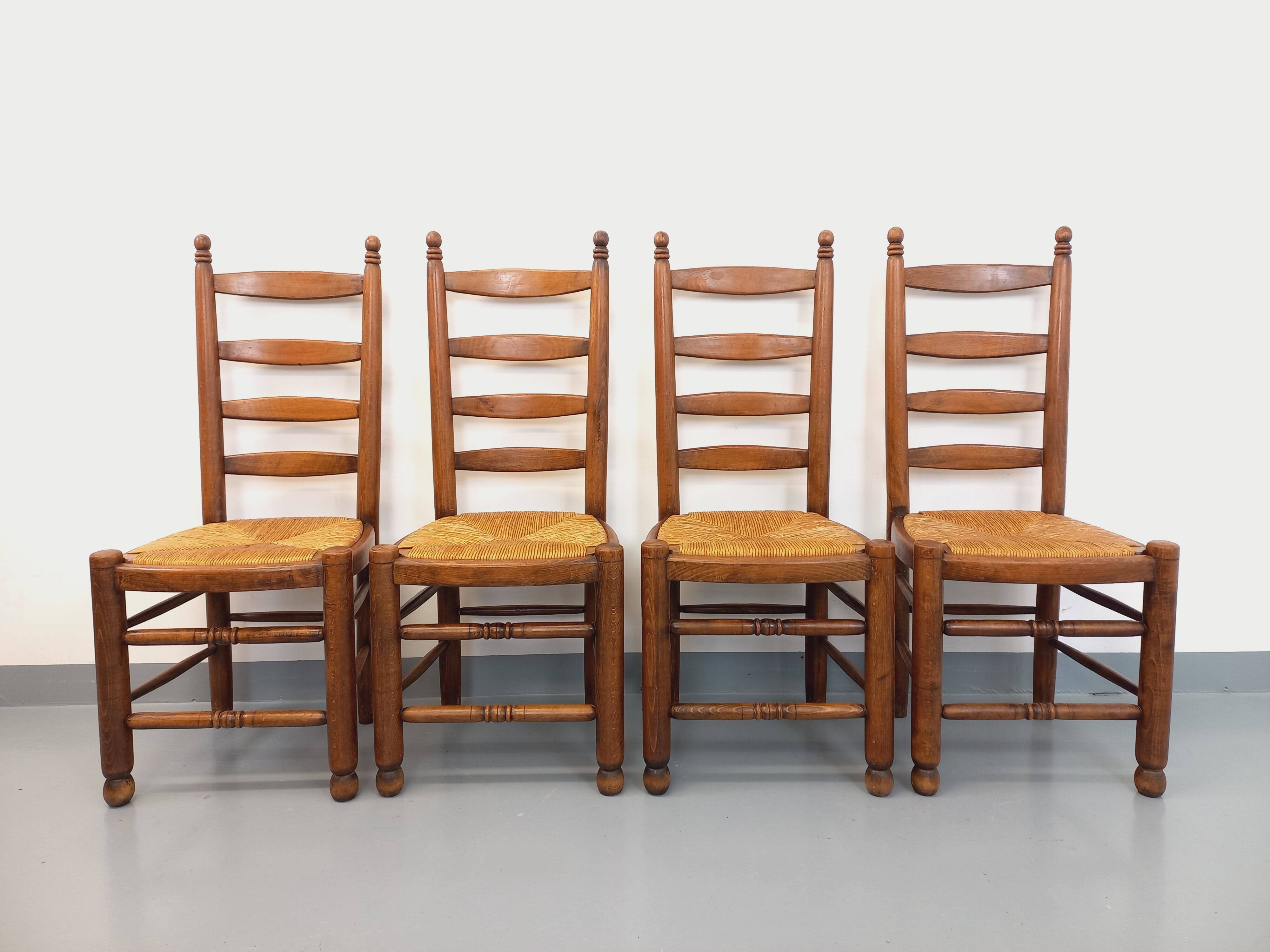 Set of 4 vintage brutalist Charles Dudouyt chairs in wood and straw from the 60s