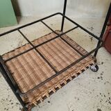 Wicker and vintage black metal trolley