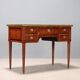 Neoclassical writing desk made of violet wood, 18th century.
