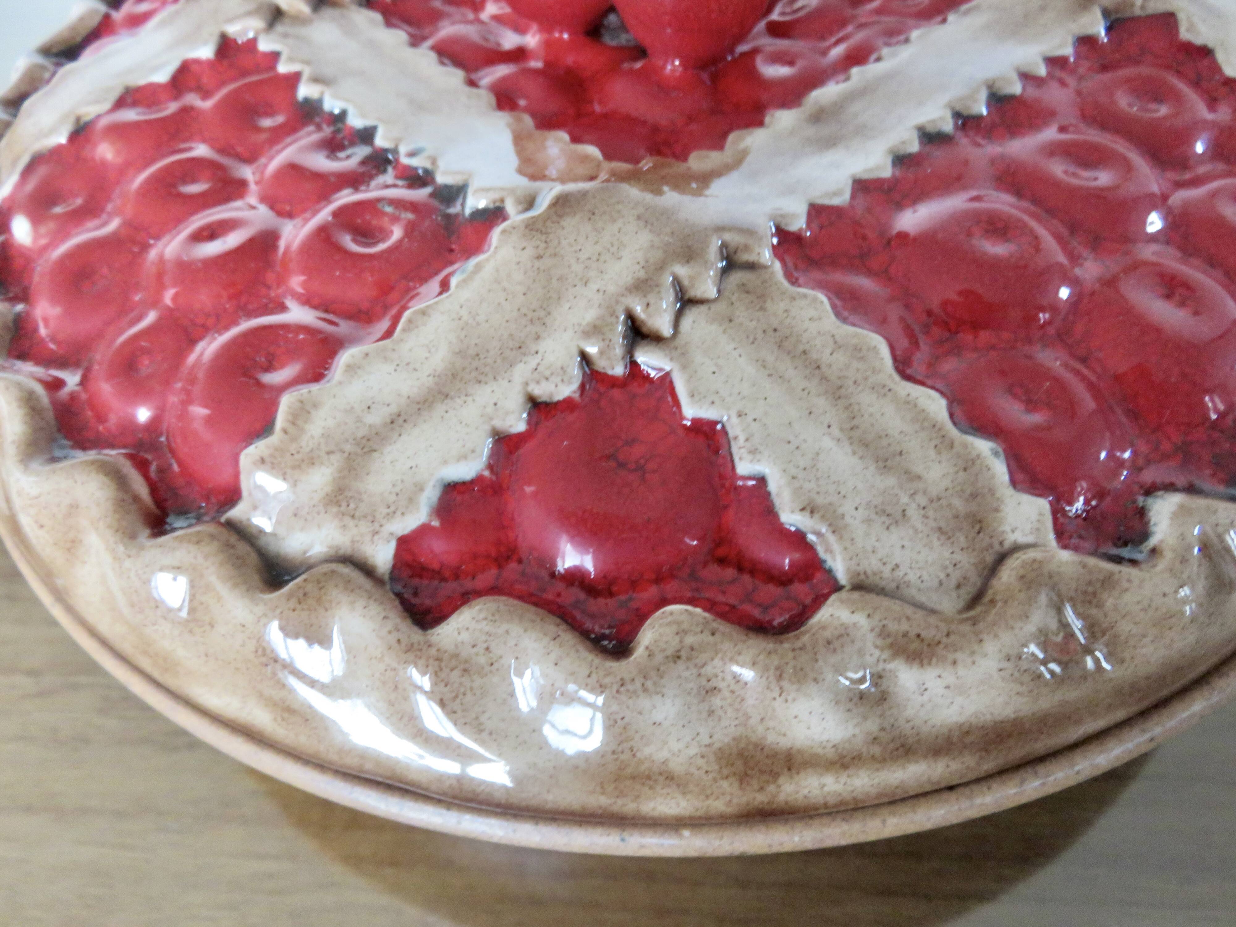 Large earthenware dish, slipware finish, Sarreguemines, France.