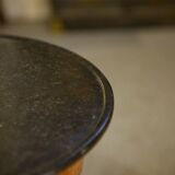 Empire gueridon in mottled maple with a blue stone top, 19th century.