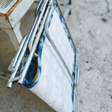 Camp bed or vintage sunbathing