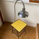 Metal bedside table, scoubidou and chrome lamp