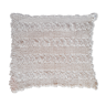 White rectangular crocheted placemat.