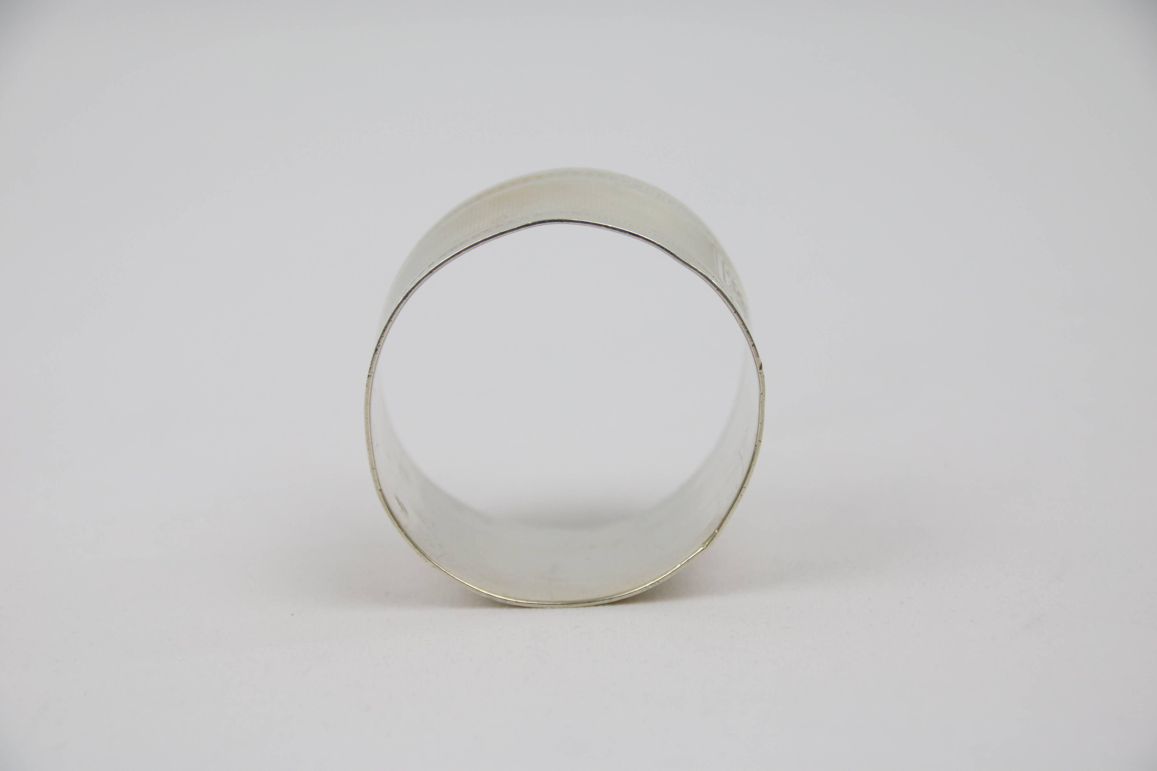 Dot towel ring and solid silver guilloches