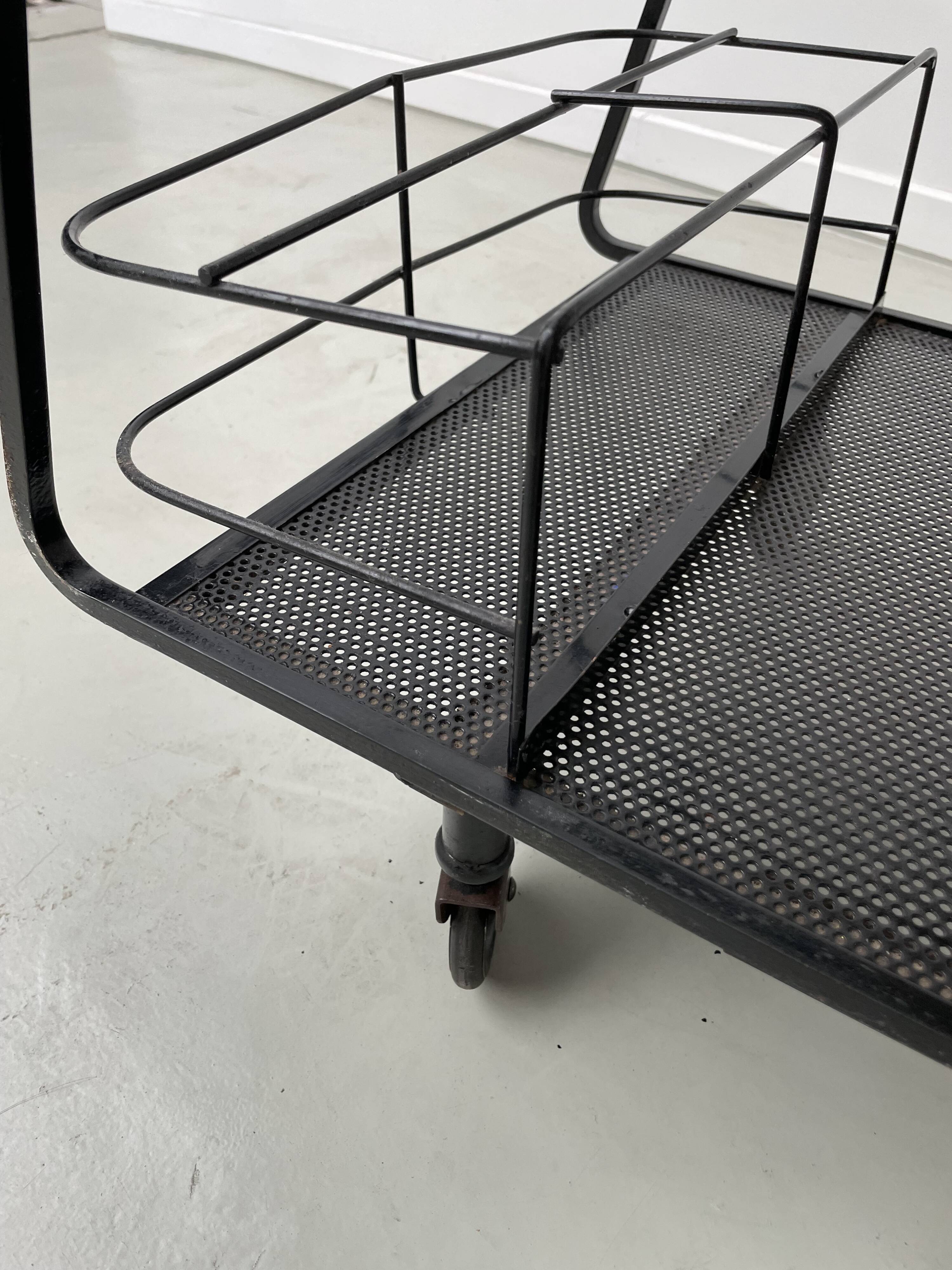 Perforated metal serving trolley in the Mathieu Matégot style