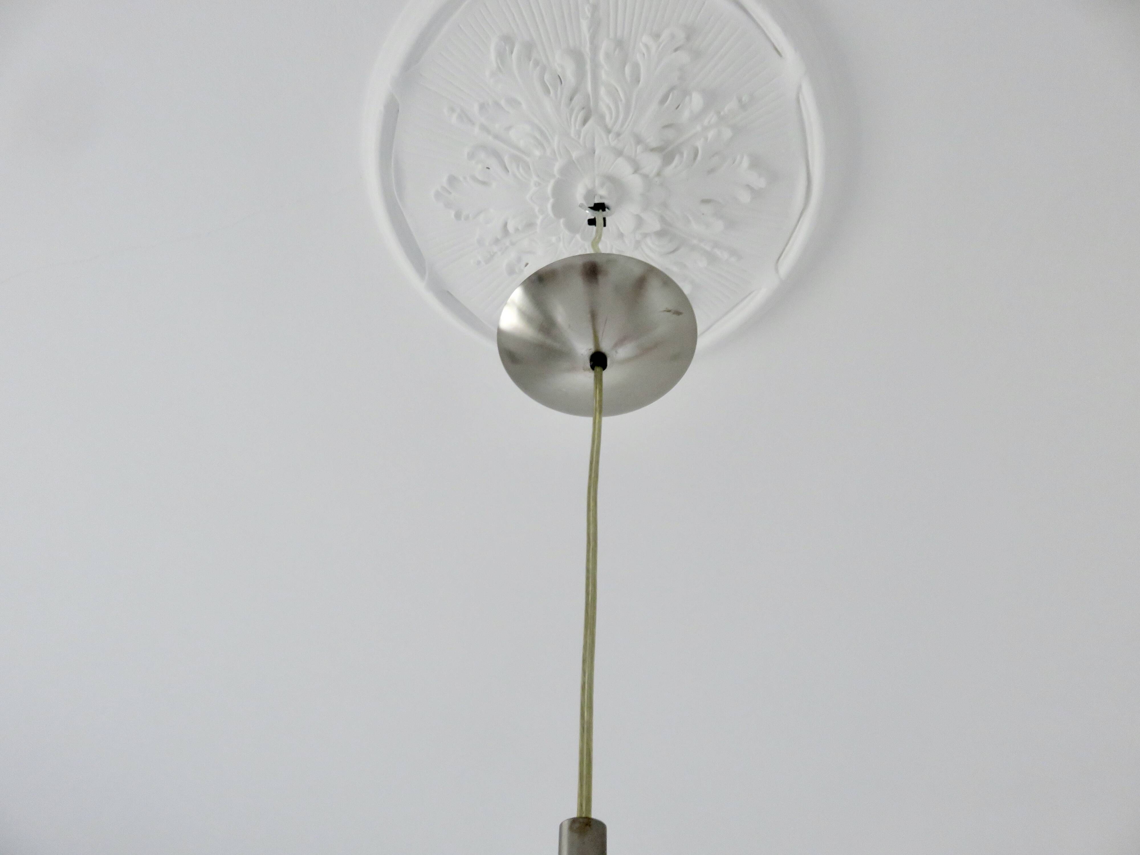 Large spherical suspension in perspex from the 1990s.