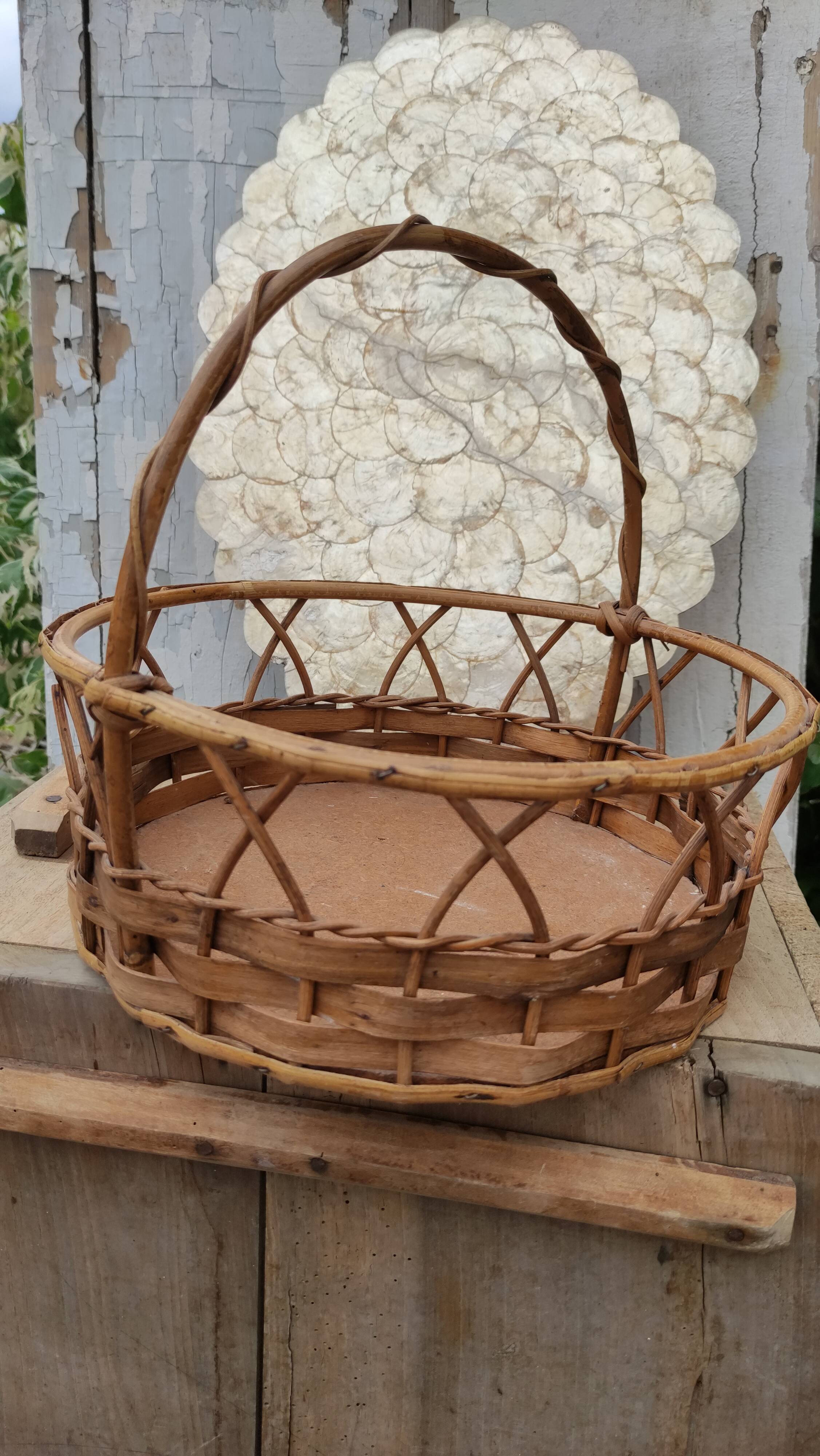 Vintage basket made of wood and rattan