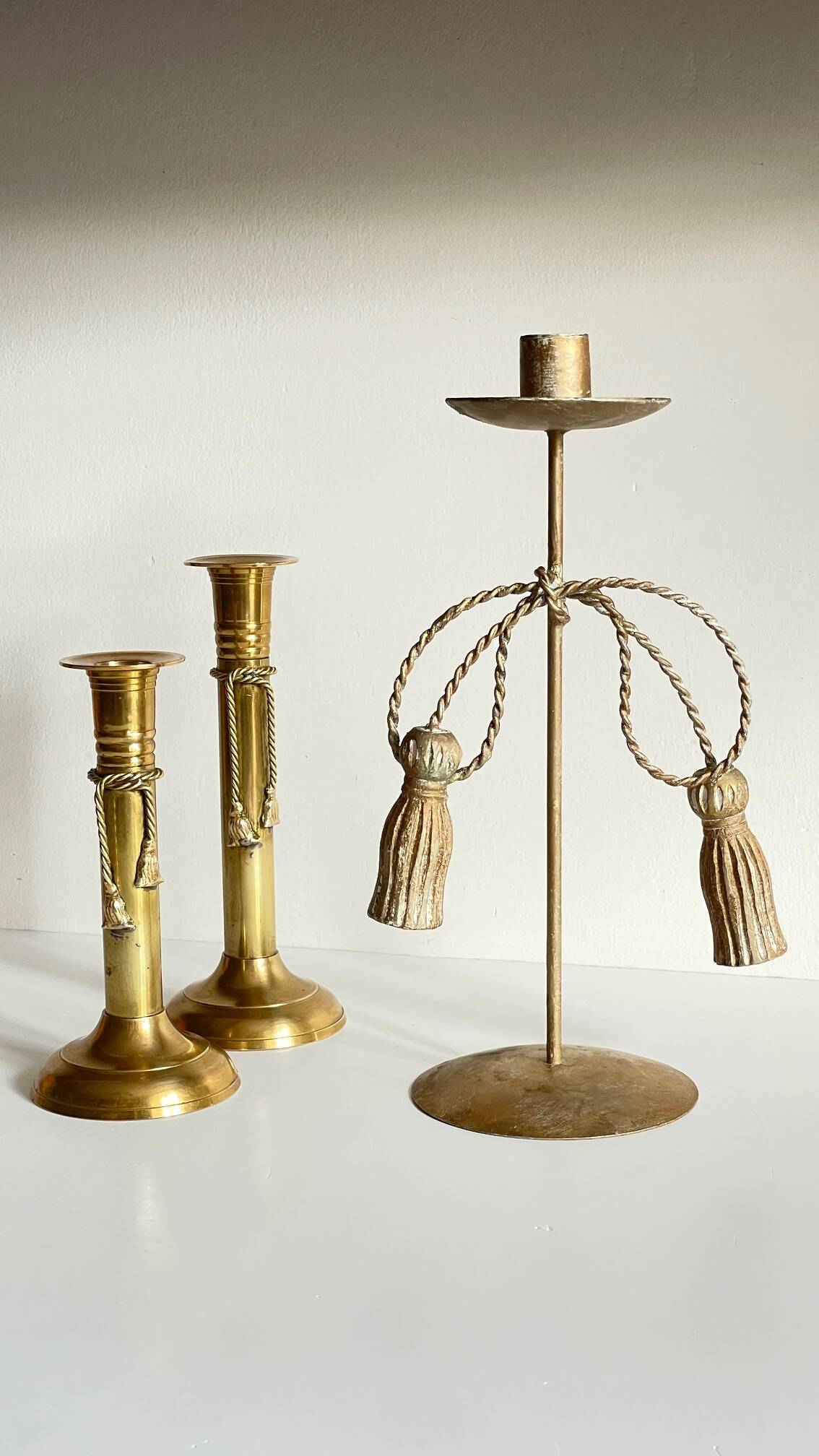 Trio of vintage knotted candlesticks brass