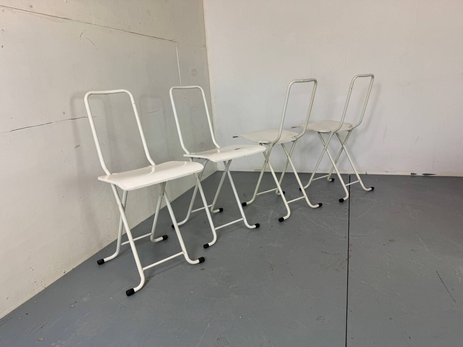 Set of 4 modernist Italian folding chairs,1980s