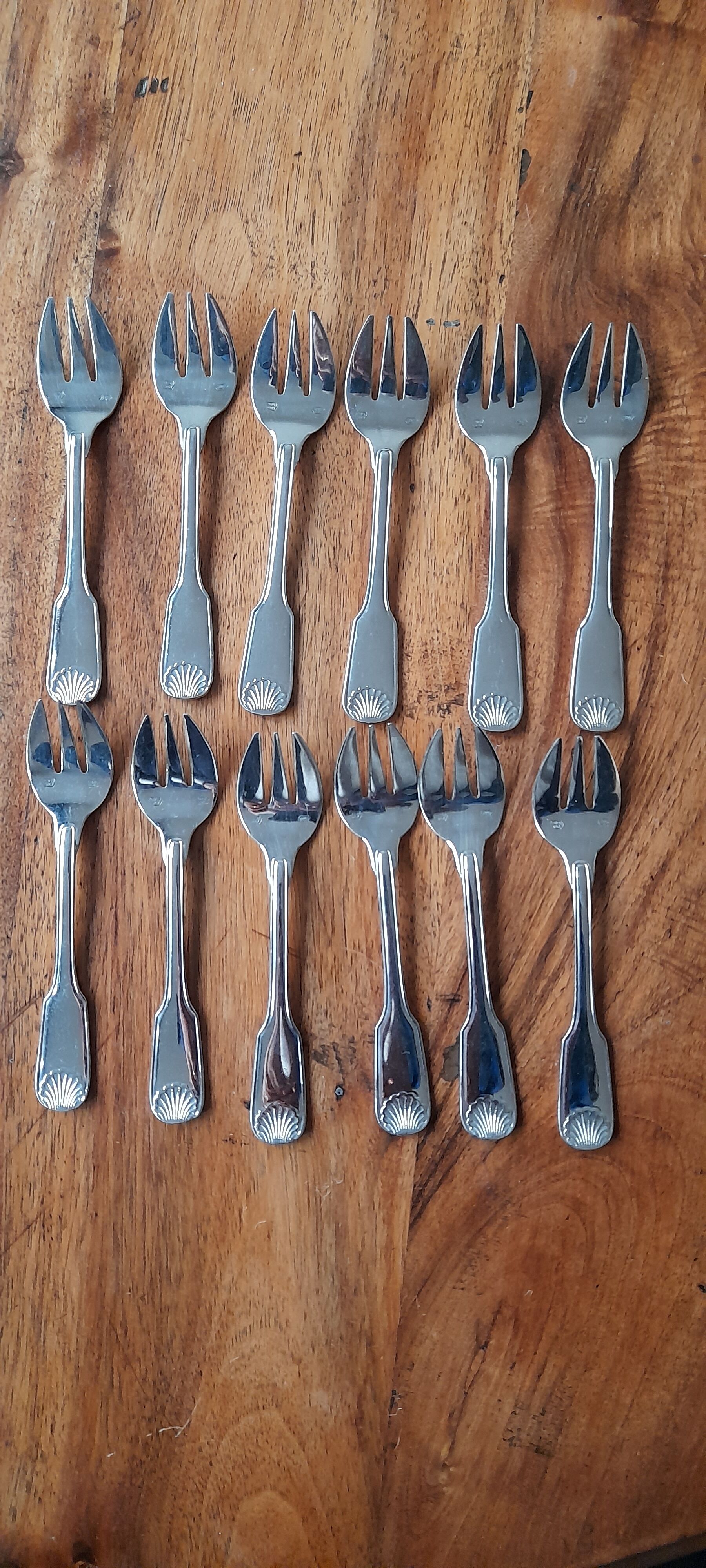 12 oyster forks