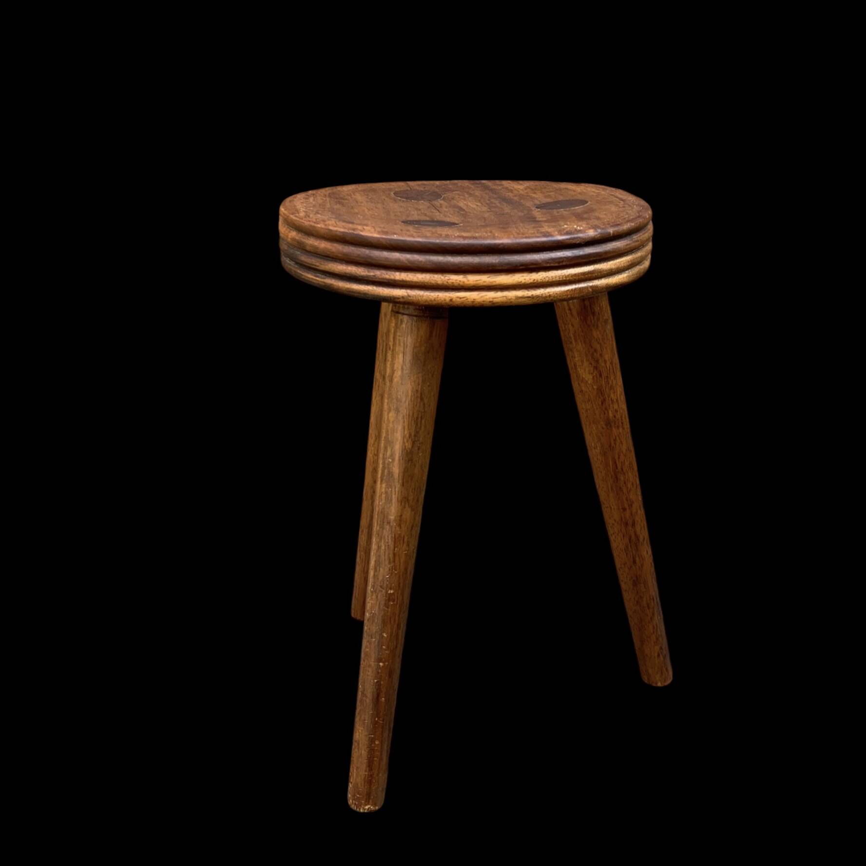 Old small wooden tripod stool