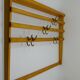 Grand coat rack Auböck Carl Mid-Century in beech with 8 brass hooks, 1950s.