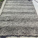 Rug in the style of a designer.