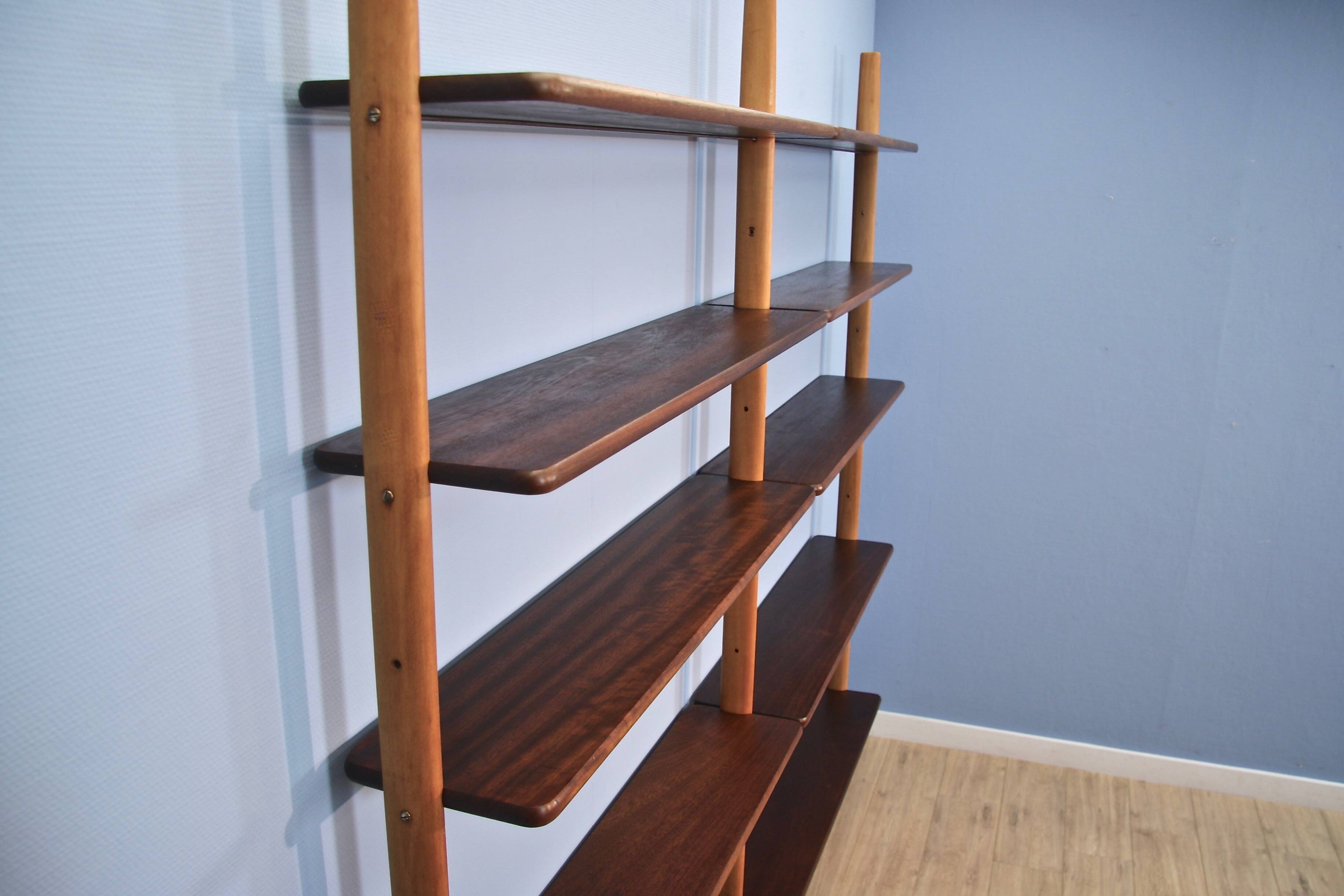 A Danish wall unit in teak and beech by William Watting for Scanflex, 1950s.