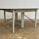 Extendable wooden dining table, white legs, 16/18 covers