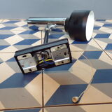 Space age articulated sconce