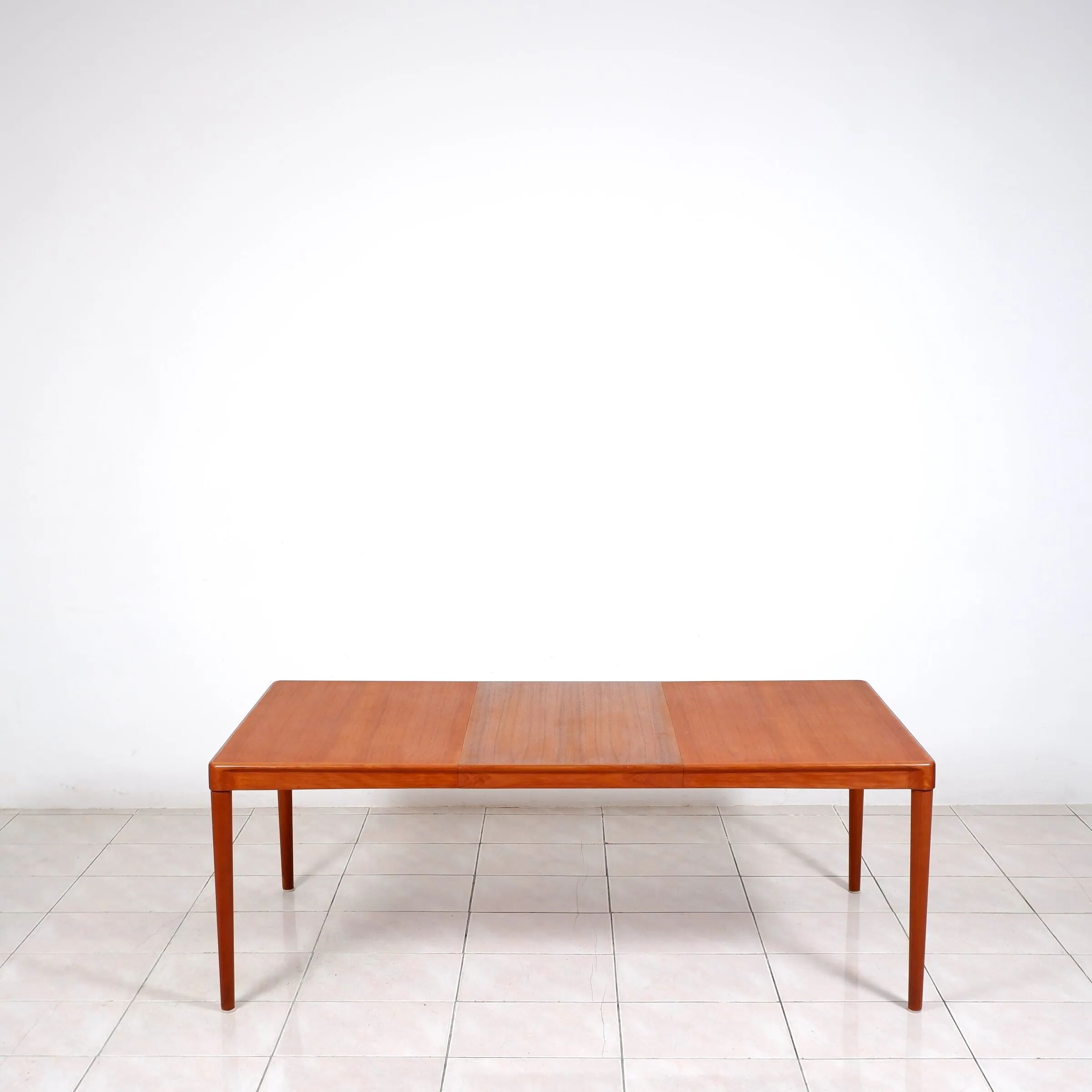 Extendable dining table in teak by H. W. Klein for Bramin Mobler