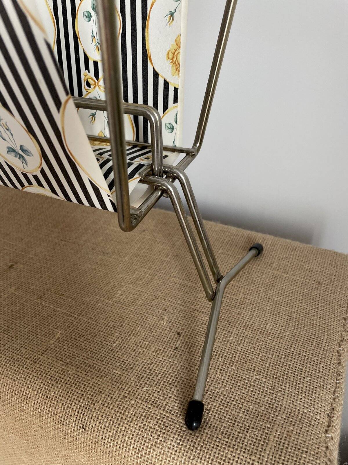 Vintage metal and plastic-coated fabric magazine rack