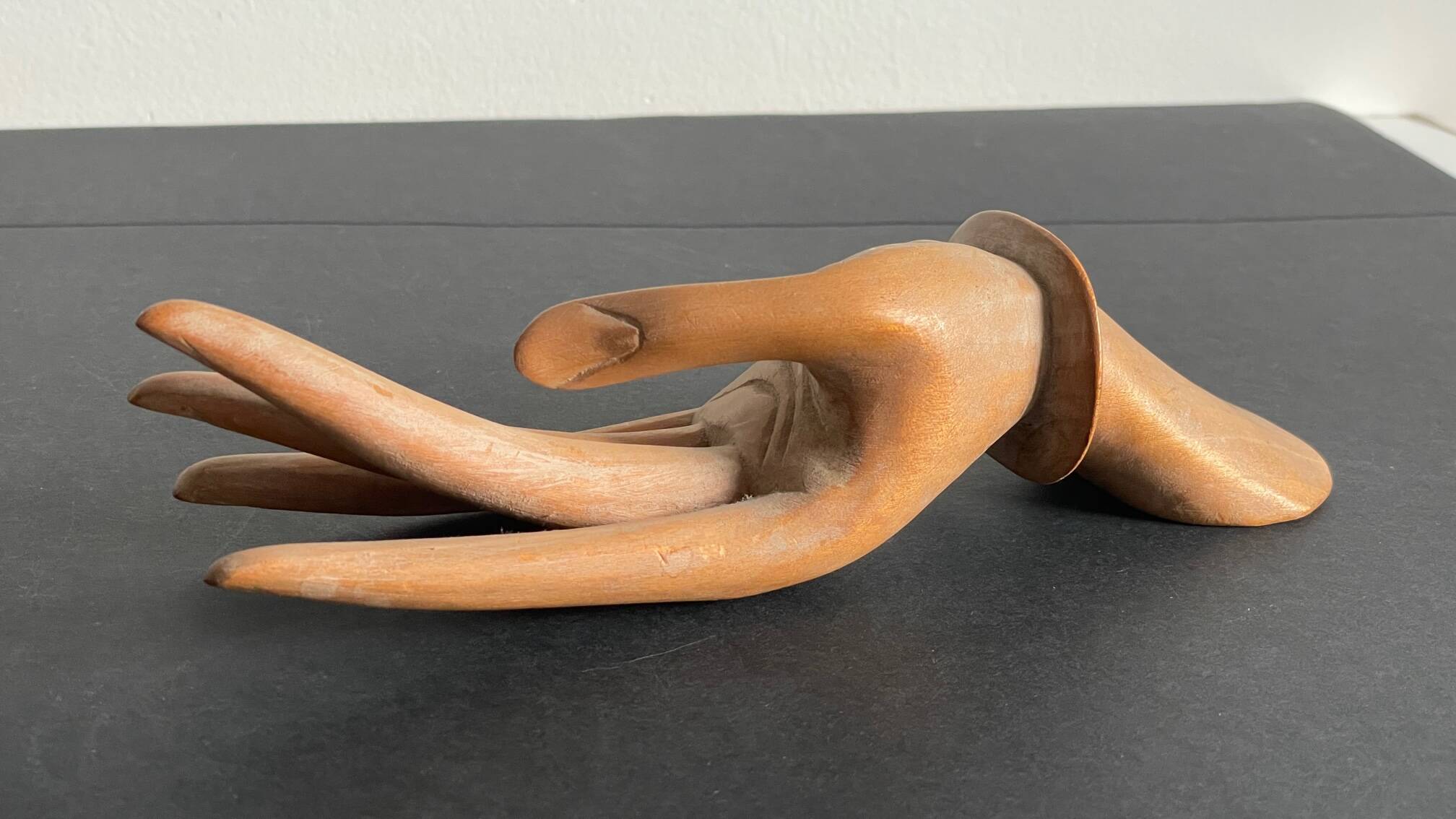 Wooden hand sculpture