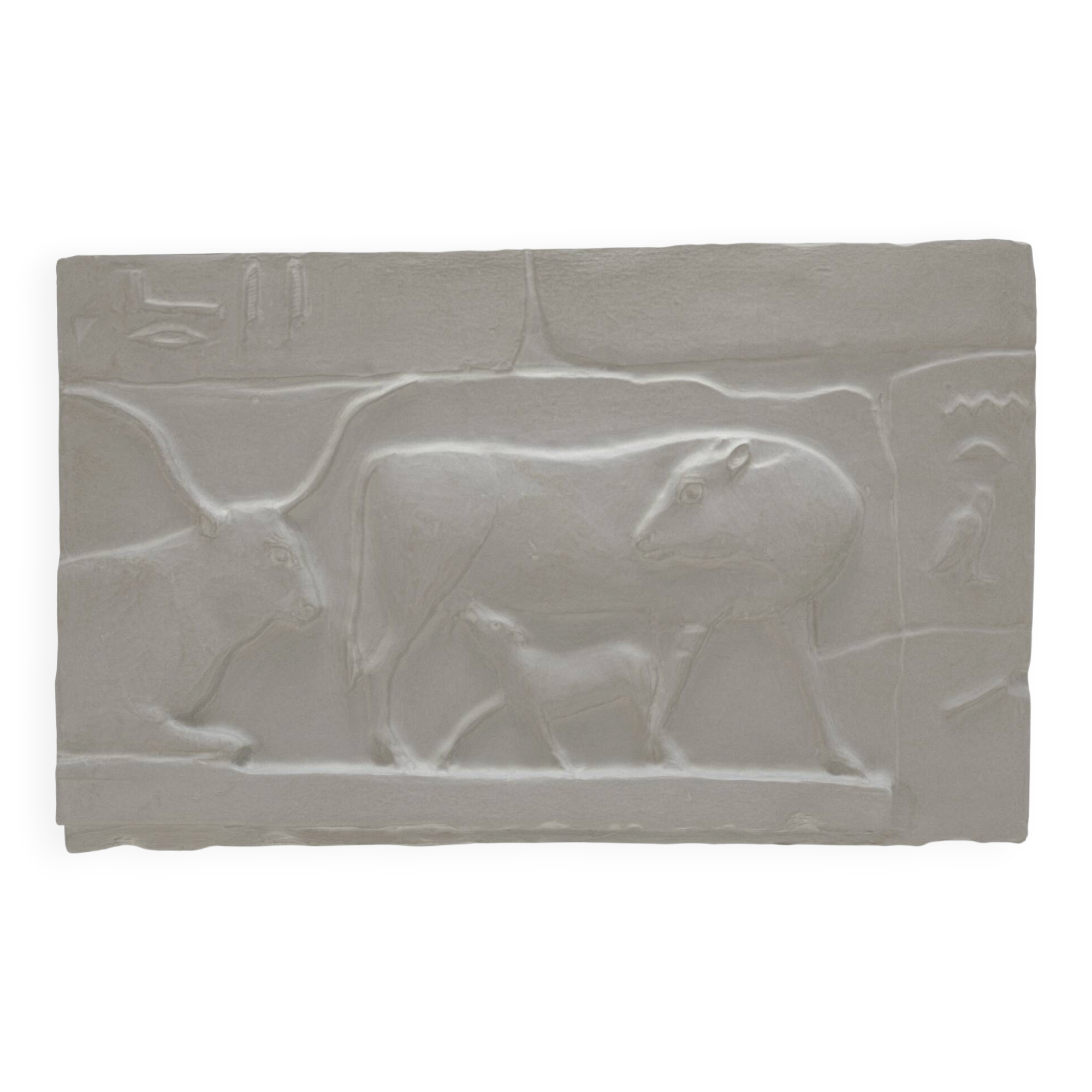 Plaster depicting two cows and a calf, based on an Egyptian fresco.