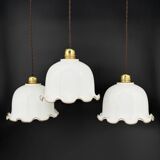 Set of 3 vintage bell-shaped pendants in white opaline with brown trim.